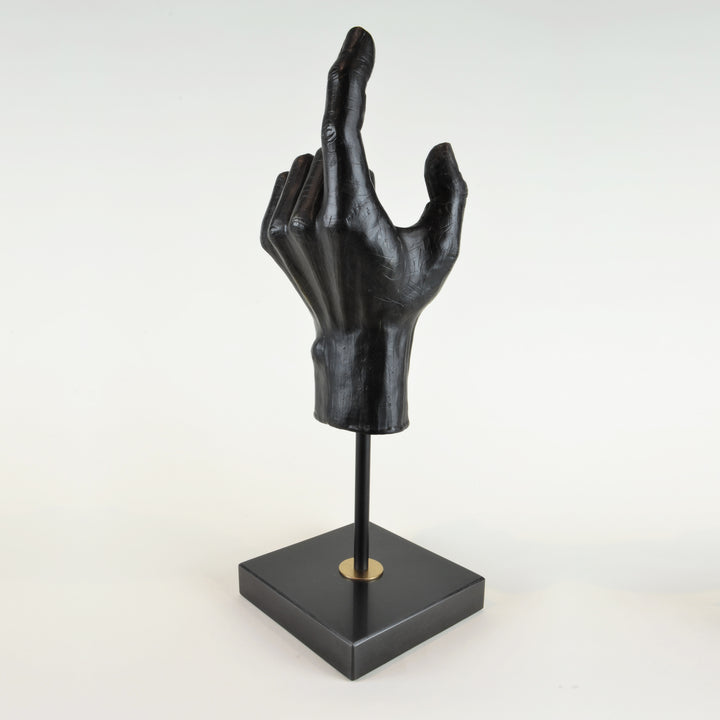 Hand Sculpture - View 2 - Decorative Object / Sculpture. Black Colour. Hand shape Sculpture. Hand made from black zinc. Black marble base. Materials: Zinc, Marble. Dimensions: W14 D14 H42cm. Masculine home accessories. Home office and library decoration. 