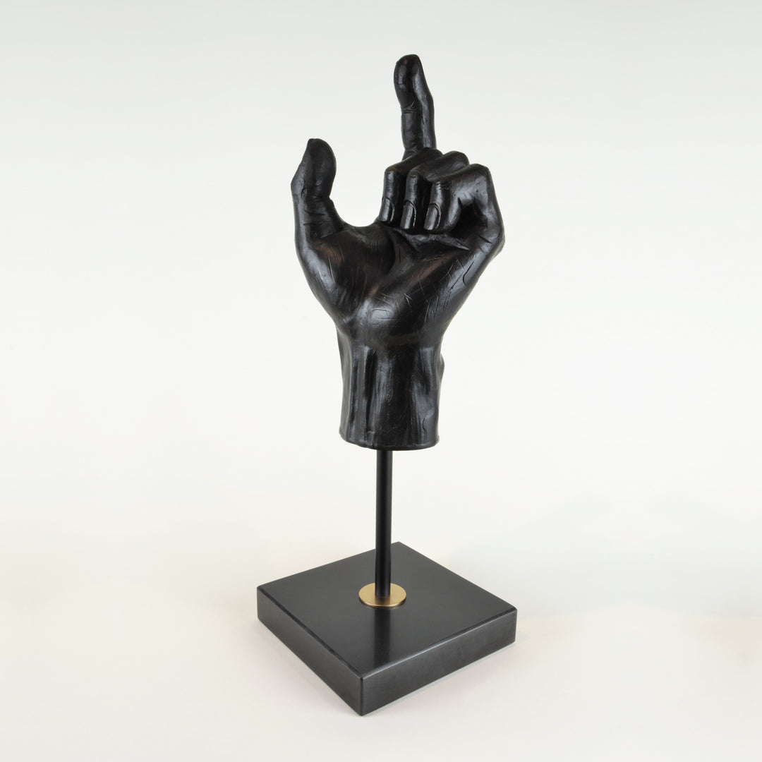 Hand Sculpture - View 3 - Decorative Object / Sculpture. Black Colour. Hand shape Sculpture. Hand made from black zinc. Black marble base. Materials: Zinc, Marble. Dimensions: W14 D14 H42cm. Masculine home accessories. Home office and library decoration. 