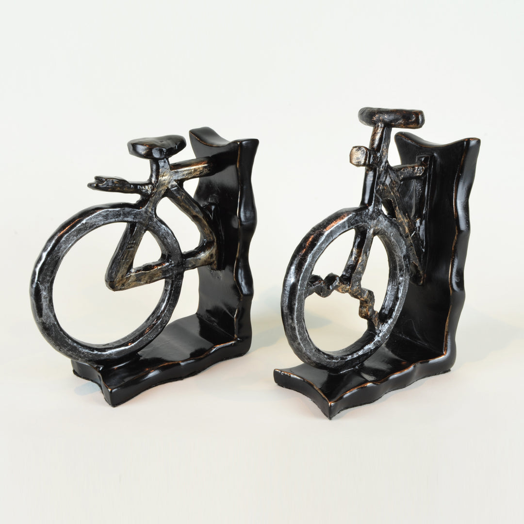 Bicycle Bookends II - Pair View 2 - A pair of bookends. Black and grey colours. Bicycle shape divided into 2 sections. Materials: Painted resin. Dimensions: W14 D6.5 H20cm (Each). Cycling home accessories. A designer gift for cyclists and spin class fitne