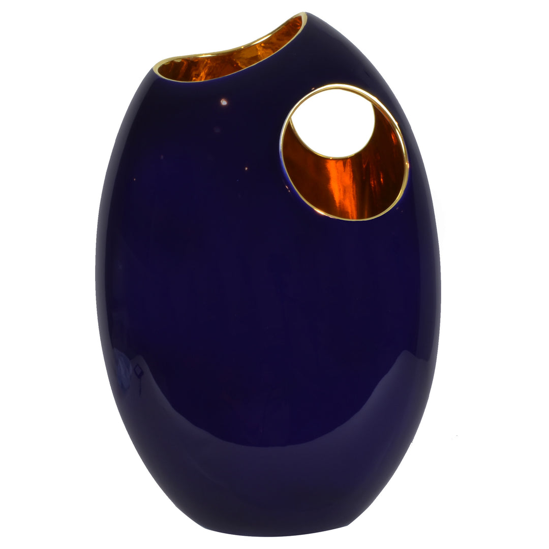 Mini Pebble Vase - Blue / Gold - Ceramic Vase. Modern style Decorative object. Organic shaped vase. Pebble shaped vase. Glossy polished finish. Available in 5 colour combinations. Vase interior colour options are Copper or Gold. Vase outside colour option