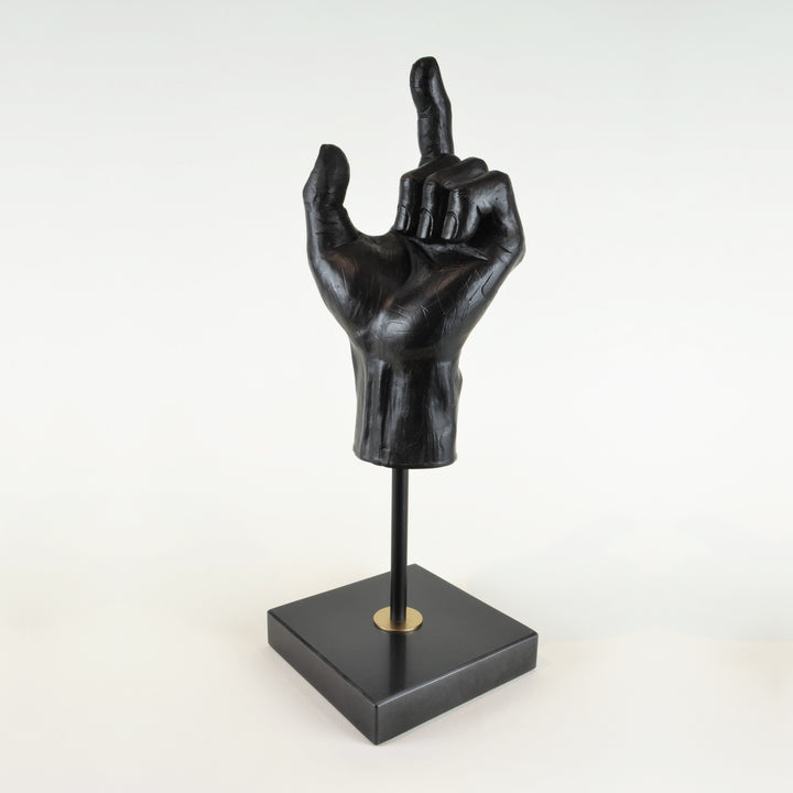 Hand Sculpture - View 3 - Decorative Object / Sculpture. Black Colour. Hand shape Sculpture. Hand made from black zinc. Black marble base. Materials: Zinc, Marble. Dimensions: W14 D14 H42cm. Masculine home accessories. Home office and library decoration. 
