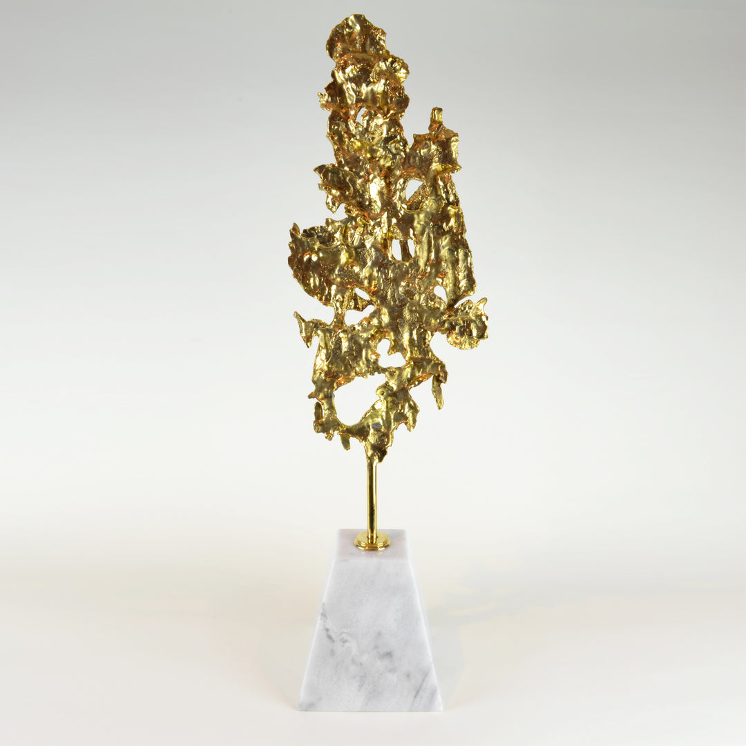 Molten Brass Leaf - View 2 - Brass Sculpture. Abstract style large decorative object. Gold colour. Calacatta marble base. Materials: Brass, Marble Centrepiece home decor. A luxurious sculpture to be the focal point in any interior. Top interior design tre