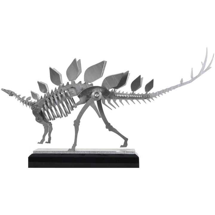 Mini Stegosaurus - View 2 - Decorative Object / Sculpture. Silver Colour. Dinosaur Sculpture. Stegosaurus skeleton ornament. Industrial chic style dinosaur object. Materials: Brushed Stainless steel. Acrylic base. Jurassic Park theme home accessories. Kid