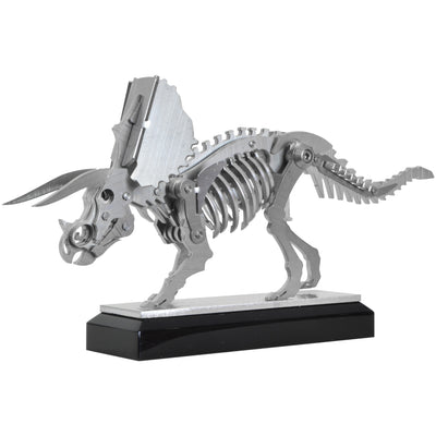 Mini Triceratops - View 1 - Decorative Object / Sculpture. Silver Colour. Dinosaur Sculpture. Triceratops skeleton ornament. Industrial chic style dinosaur object. Materials: Brushed Stainless steel. Acrylic base. Jurassic Park theme home accessories. Kid