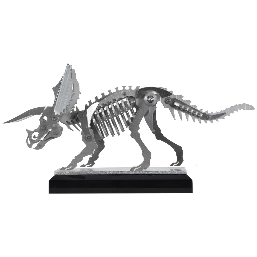 Mini Triceratops - View 2 - Decorative Object / Sculpture. Silver Colour. Dinosaur Sculpture. Triceratops skeleton ornament. Industrial chic style dinosaur object. Materials: Brushed Stainless steel. Acrylic base. Jurassic Park theme home accessories. Kid