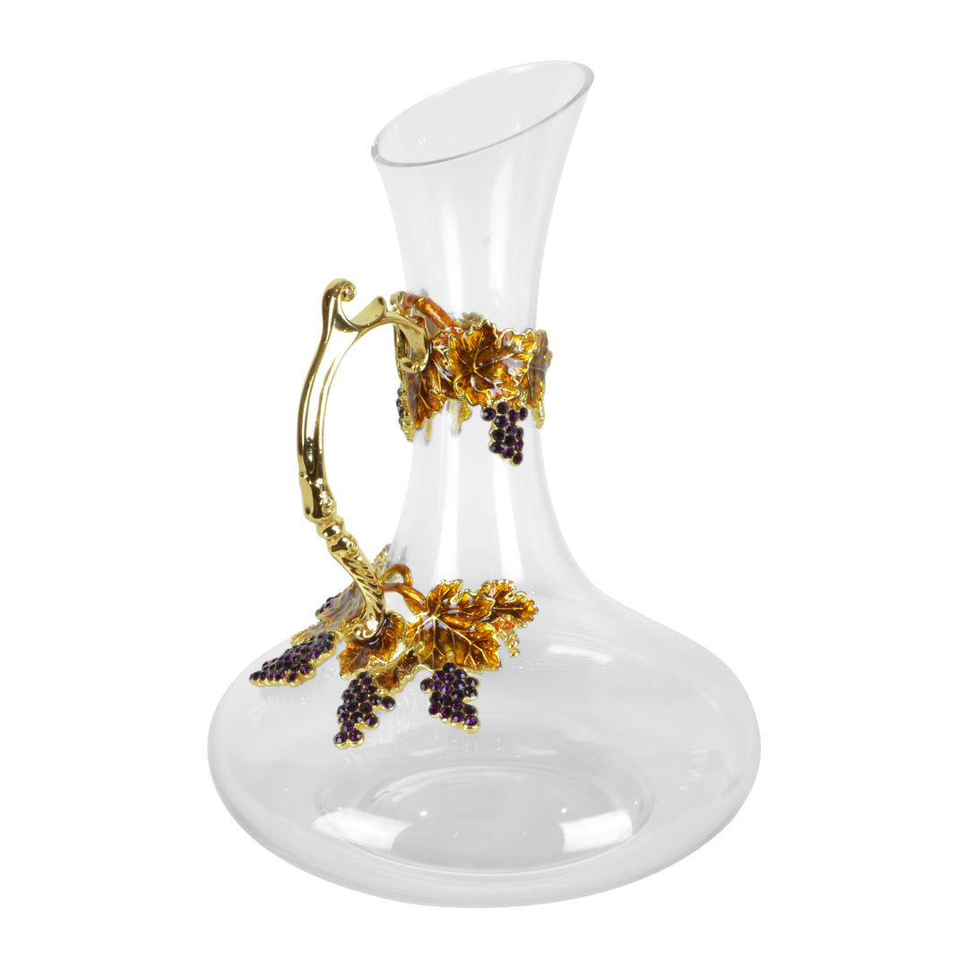 Amber Wine Carafe - Carafe. Set includes 1x Carafe and 4x Wine Glasses. Gold and Amber colour. Intricate metal and natural stone vine leaves detail. Natural Amber material and Swarovski coloured crystals.  Materials: High Grade Glass, Brass, Amber, Lacque