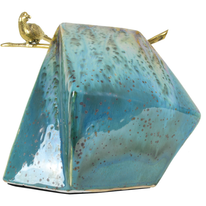 Bird on Large Rock - Teal View 2 - Brass Sculpture / Decorative Object. Bird sculptural detail. Gold Bird Colour. Ceramic rock shaped base in two colourways: Teal and Brown. Materials: Brass, Ceramic. Dimensions: W34 D24 H27cm. Bird and nature theme home 