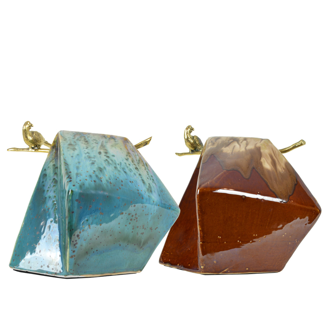 Bird on Large Rock - Colourways - Brass Sculpture / Decorative Object. Bird sculptural detail. Gold Bird Colour. Ceramic rock shaped base in two colourways: Teal and Brown. Materials: Brass, Ceramic. Dimensions: W34 D24 H27cm. Bird and nature theme home a